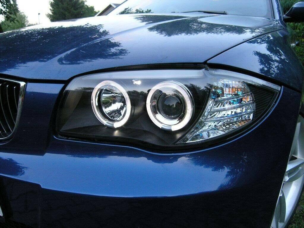 FARI ANTERIORI LED ANGEL EYES NERO PER BMW E81 E82 E87 E88 04-11 SERIE 1 FANALI
